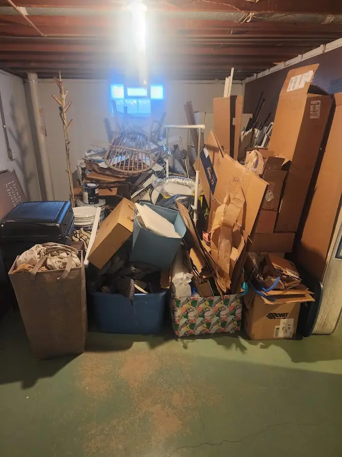 Roll-off dumpster container at job site for 6 Yard Dumpster Rental in Robinson